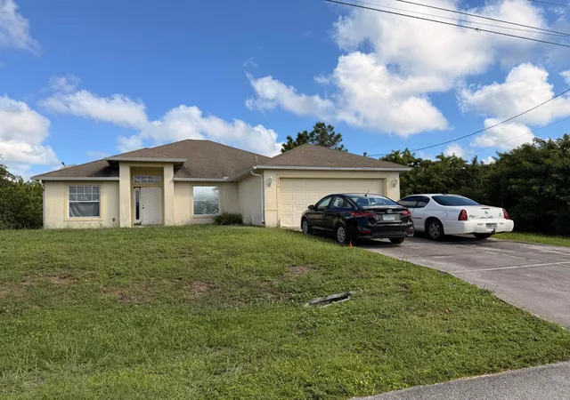 Photo 1 of Single family home for sale at 739 Cane St E, Lehigh Acres, FL 33974 | MLS# B26092675 | Listing updated on 2026-10-29