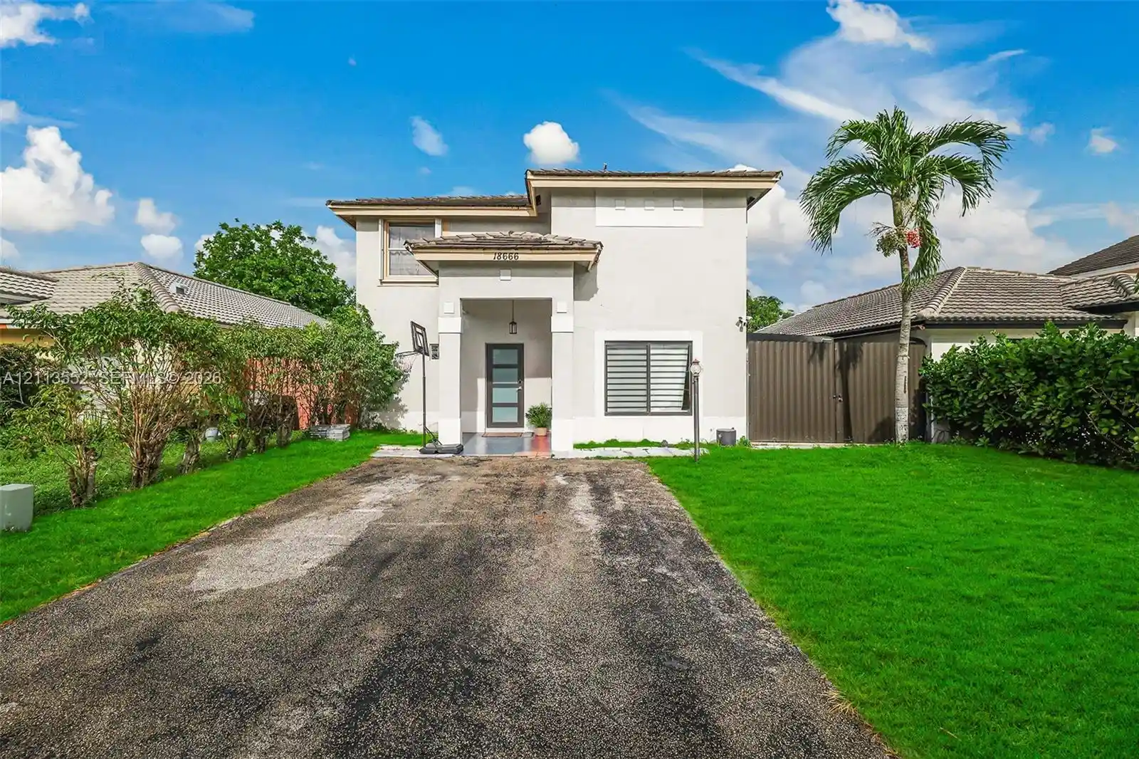 Single family home for sale at 18666 NW 52nd Path, Miami Gardens, FL 33055 | MLS# A12113552
