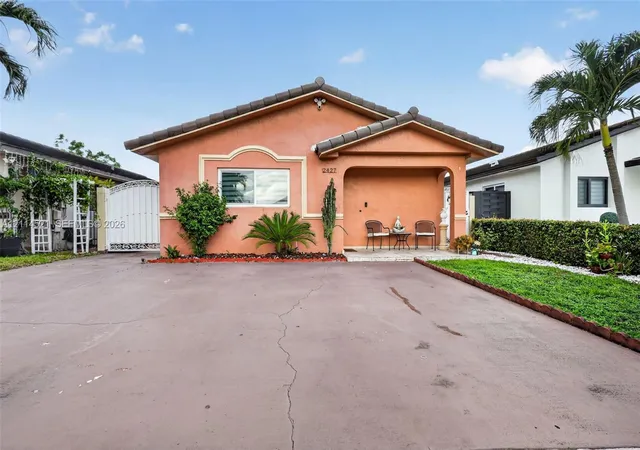 Single family home for sale at 2427 W 70th Place, Hialeah, FL 33016 | MLS# A12114521