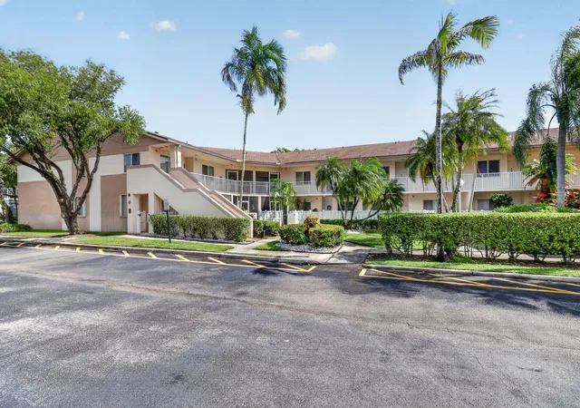 Listing Photo 1 - Condo for sale in building located at 7365 N Devon Dr, Tamarac, FL 33321 - Unit #103