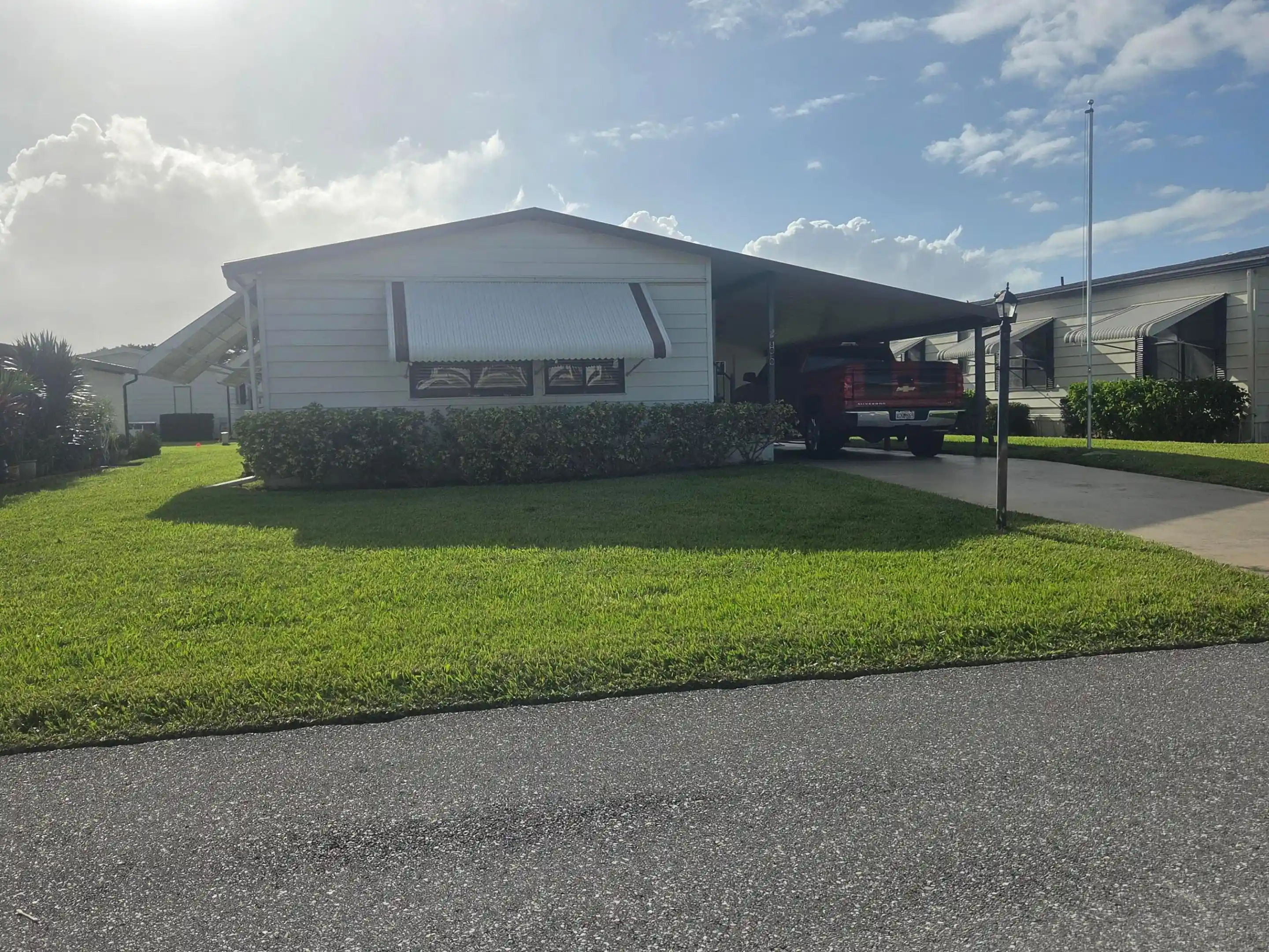 Photo 1 of Manufactured home for sale at 8010 Se Shenandoah Dr, Hobe Sound, FL 33455 | MLS# B26094231 | Listing updated on 2026-10-29