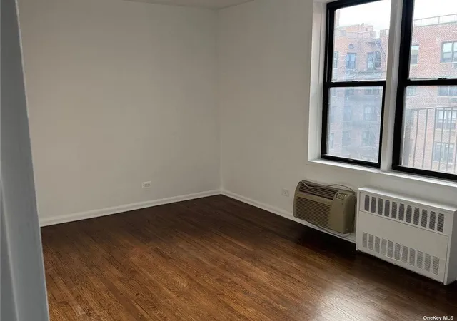 5th image of 65-50 Wetherole St, New York, NY 11374
