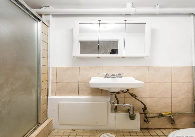 Photo 3 of Sale Pending at 31 14 77 Street, East Elmhurst, NY 11370 | MLS# L3587467 | Listing updated on 2025-04-08