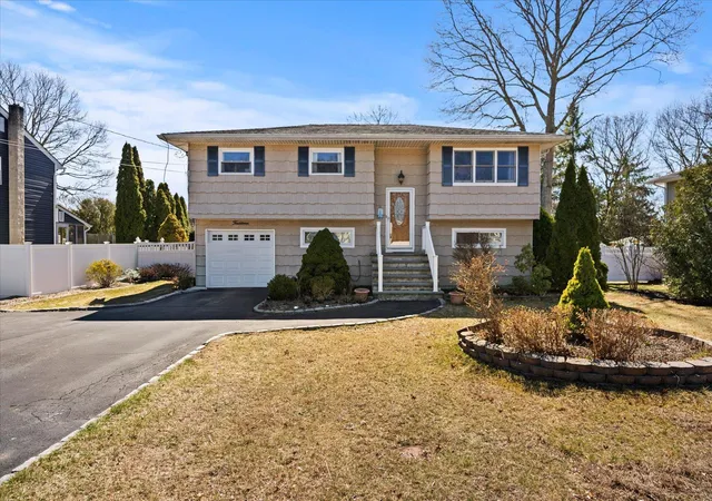 Single family home for sale at 14 Floradora Dr, Mastic, NY 11950 | MLS# 840857 | Listing updated on 2025-03-30