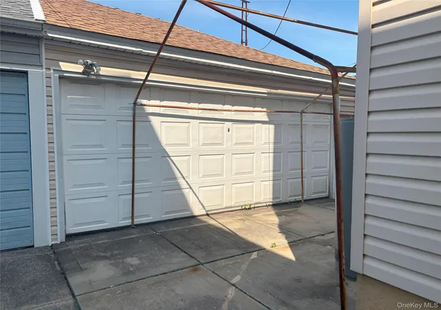 Photo 3 of Multi family home for sale at 104 16 103 Street, Ozone Park, NY 11417 | MLS# 876979 | Listing updated on 2026-07-07
