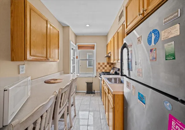 Photo 3 of Sale Pending at 11919 236Th St, Cambria Heights, NY 11411 | MLS# 888918 | Listing updated on 2025-09-29
