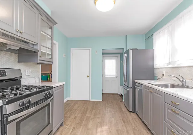 Photo 3 of Sale Pending at 24 Walnut St, Westbury, NY 11590 | MLS# 906635 | Listing updated on 2025-12-22