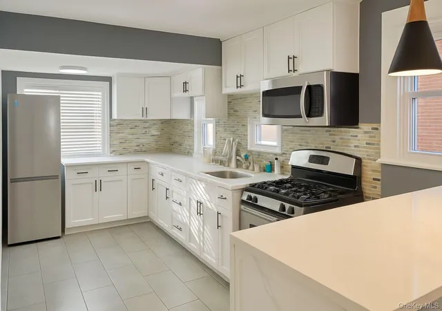 Photo 2 of Sale Pending at 14 Parsons Dr, Hempstead, NY 11550 | MLS# 928849 | Listing updated on 2026-02-07
