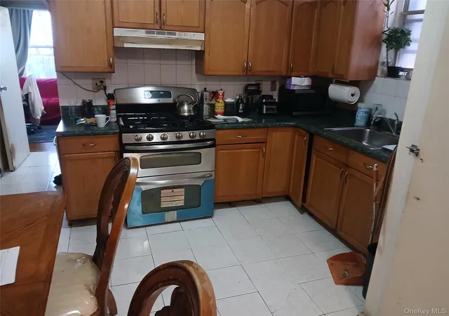 Photo 2 of Multi family home for sale at 95 13 42 Avenue, Elmhurst, NY 11373 | MLS# 930029 | Listing updated on 2025-12-03