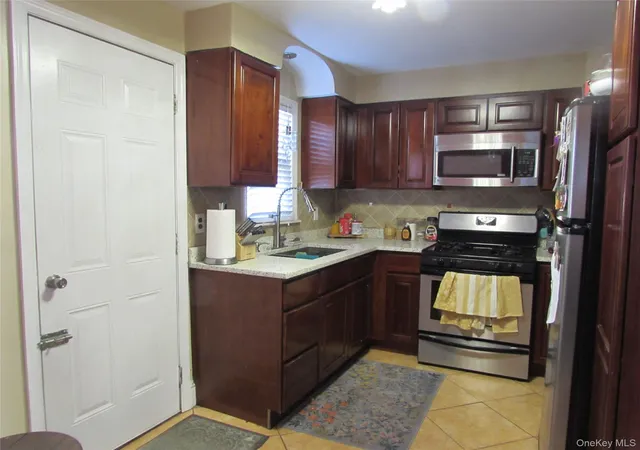 Photo 2 of Single family home for sale at 51 Phoenix St, Hempstead, NY 11550 | MLS# 936907 | Listing updated on 2026-04-03