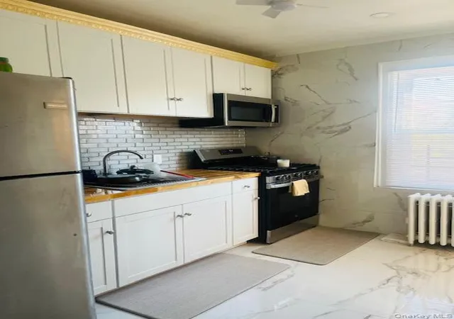 22nd image of 107 35 E Van Wyck Exp E Van Wyck, Jamaica, NY 11435 | MLS# 939850