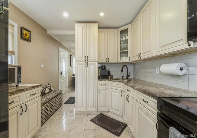 Photo 3 of Sale Pending at 13 Floral Ln, Westbury, NY 11590 | MLS# 941156 | Listing updated on 2026-02-03