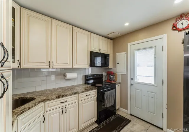 Photo 4 of Sale Pending at 13 Floral Ln, Westbury, NY 11590 | MLS# 941156 | Listing updated on 2026-02-03