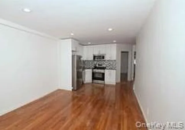 Photo 3 of Multi family home for sale at 25 37 72nd Street, East Elmhurst, NY 11370 | MLS# 944504 | Listing updated on 2025-12-27