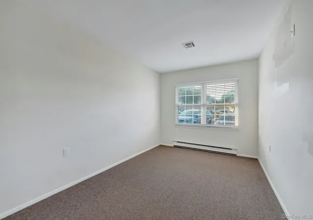 2nd image of 164 Falmouth Ct, Ridge, NY 11961