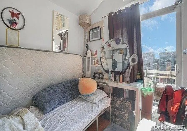 2nd image of 104 61 42nd Ave, Corona, NY 11368 | MLS# 949575