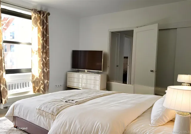 Listing Photo 1 - Condo for sale in building located at 91-10 32nd Ave, New York, NY 11369 - Unit #E306