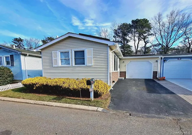 Photo 1 of Manufactured home for sale at 21 Village Cir E, Brookhaven, NY 11949 | MLS# 955586 | Listing updated on 2026-10-03