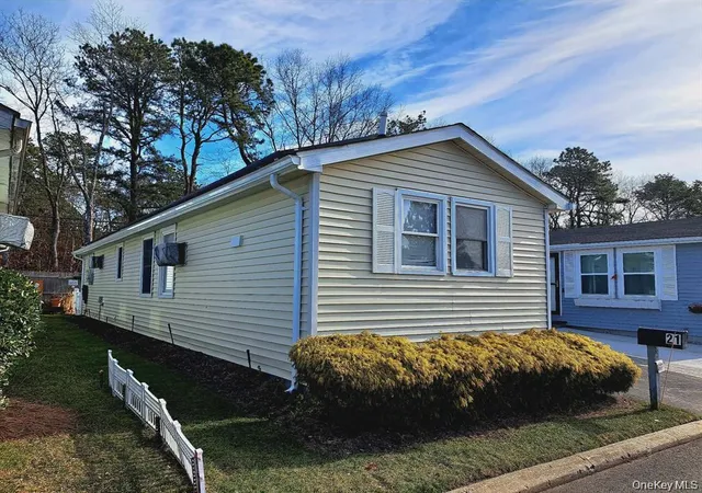 Photo 2 of Manufactured home for sale at 21 Village Cir E, Brookhaven, NY 11949 | MLS# 955586 | Listing updated on 2026-10-03