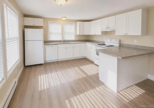 Photo 3 of Manufactured home for sale at 21 Village Cir E, Brookhaven, NY 11949 | MLS# 955586 | Listing updated on 2026-10-03