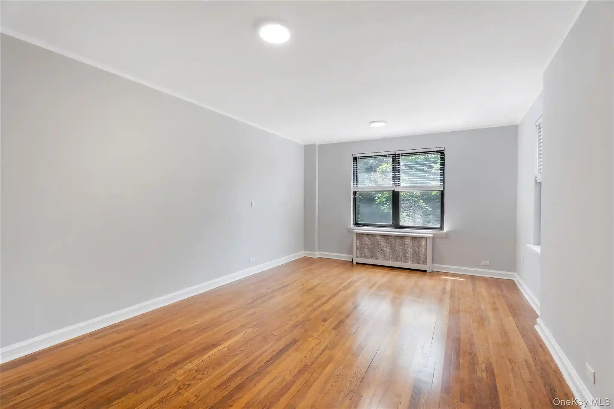 Listing Photo 2 - Condo for sale in 76-12 Ditmars Blvd located at 76-12 Ditmars Blvd, New York, NY 11370 - Unit #B3