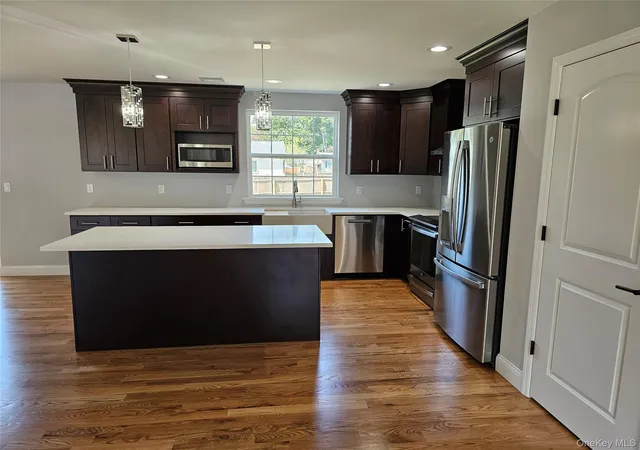 Photo 3 of Sale Pending at 13 N Swezeytown Rd, Brookhaven, NY 11953 | MLS# 963453 | Listing updated on 2026-05-10