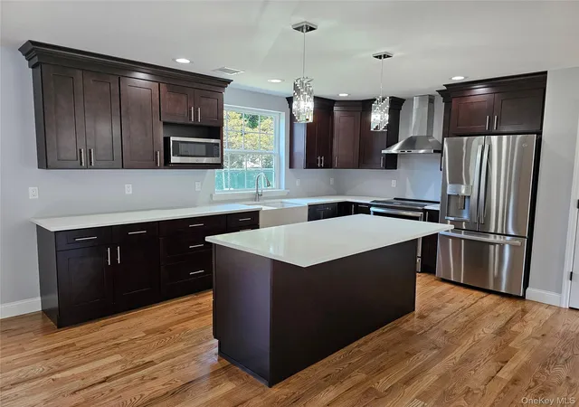 Photo 4 of Sale Pending at 13 N Swezeytown Rd, Brookhaven, NY 11953 | MLS# 963453 | Listing updated on 2026-05-10