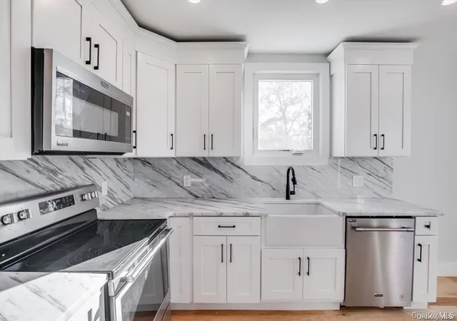 Photo 4 of Single family home for sale at 4 Riverside Ave, Brookhaven, NY 11951 | MLS# 967520 | Listing updated on 2026-10-01