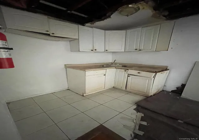 Photo 4 of Sale Pending at 13022 Springfield Blvd, New York, NY 11413 | MLS# 970615 | Listing updated on 2026-03-21