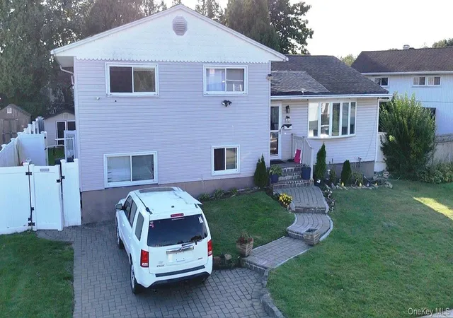 Photo 2 of Single family home for sale at 58 Narcissus Ave, Hicksville, NY 11801 | MLS# 975111 | Listing updated on 2026-08-30