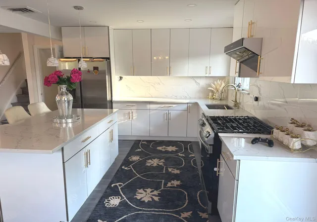 Photo 4 of Single family home for sale at 58 Narcissus Ave, Hicksville, NY 11801 | MLS# 975111 | Listing updated on 2026-08-30