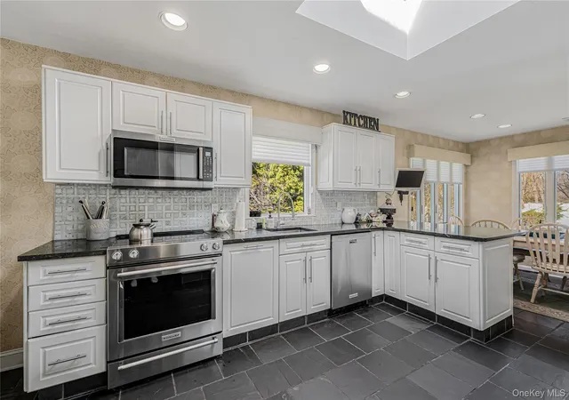 Photo 4 of Sale Pending at 18 Woodland Rd, North Hempstead, NY 11576 | MLS# 975831 | Listing updated on 2026-04-12