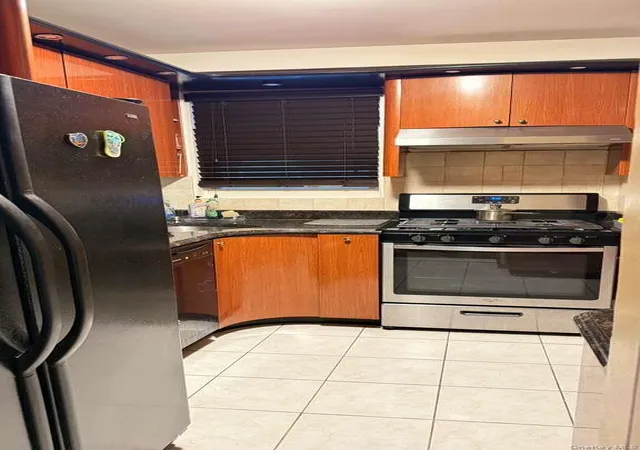 3rd image of 9710 62Nd Dr, New York, NY 11374