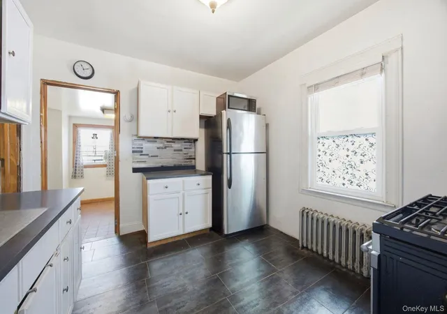 Photo 3 of Single family home for sale at 207-09 48th Avenue, Oakland Gardens, NY 11364 | MLS# 978533 | Listing updated on 2026-08-12