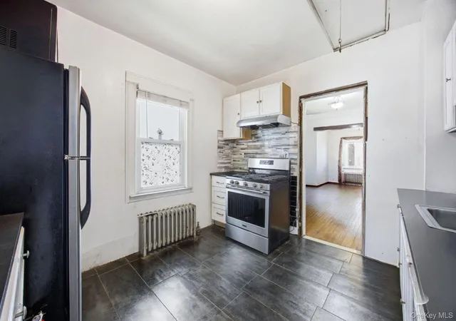Photo 4 of Single family home for sale at 207-09 48th Avenue, Oakland Gardens, NY 11364 | MLS# 978533 | Listing updated on 2026-08-12
