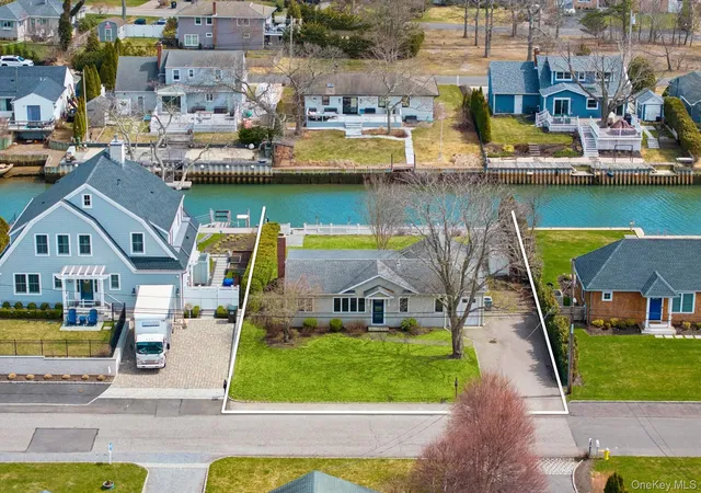 Photo 2 of Single family home for sale at 21 Tarpon Rd, East Quogue, NY 11942 | MLS# 979302 | Listing updated on 2026-08-09