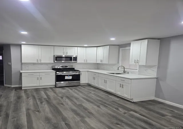 Photo 3 of Multi family home for sale at 132 04 95th Avenue, New York, NY 11419 | MLS# 980529 | Listing updated on 2026-09-06