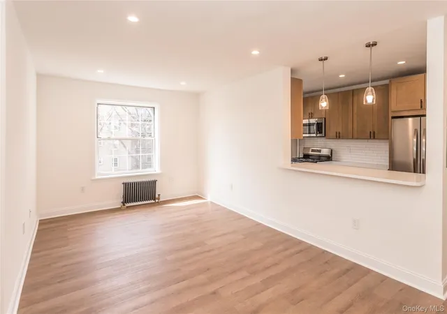 4th image of 55-23 31St Ave, New York City, NY 11377