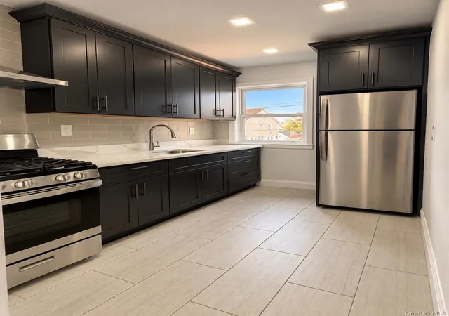 Photo 2 of House for sale at 88-30 79th Avenue, New York, NY 11385 | MLS# 982181 | Listing updated on 2026-10-18