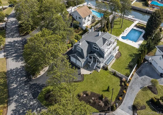 Photo 3 of Single family home for sale at 8 Cnl Way, Hampton Bays, NY 11946 | MLS# 982524 | Listing updated on 2026-09-01