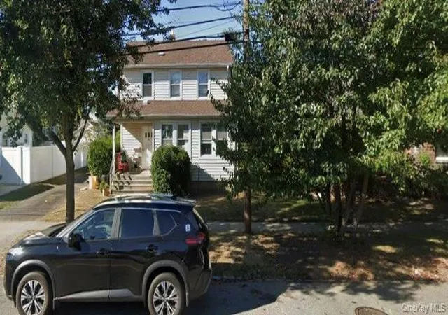 Photo 1 of Single family home for sale at 52 John St E, Hicksville, NY 11801 | MLS# 984729 | Listing updated on 2026-06-28