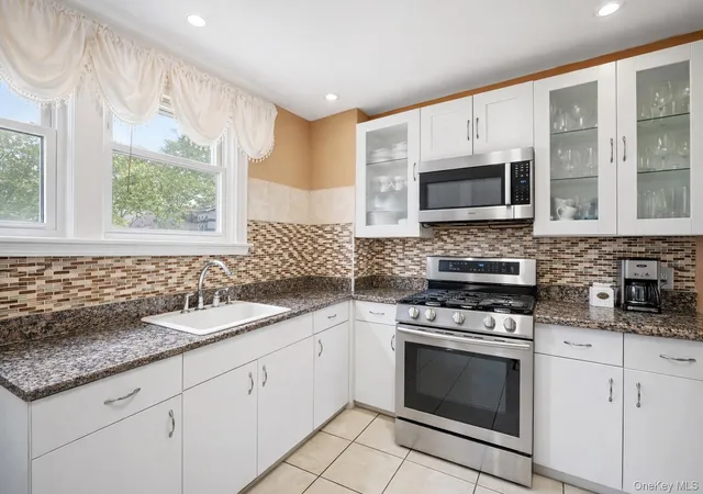 Photo 4 of Single family home for sale at 5911 Fresh Pond Rd, Maspeth, NY 11378 | MLS# 986078 | Listing updated on 2026-09-07