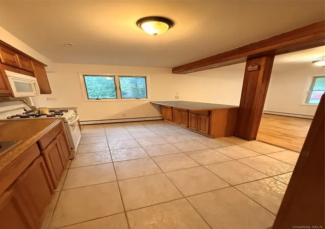 Photo 4 of Single family home for sale at 13 Hampton Ave, Brookhaven, NY 11950 | MLS# 988118 | Listing updated on 2026-08-29