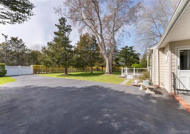 Photo 3 of Sale Pending at 4 Hampton Harbor Ln, Hampton Bays, NY 11946 | MLS# 990556 | Listing updated on 2026-08-24