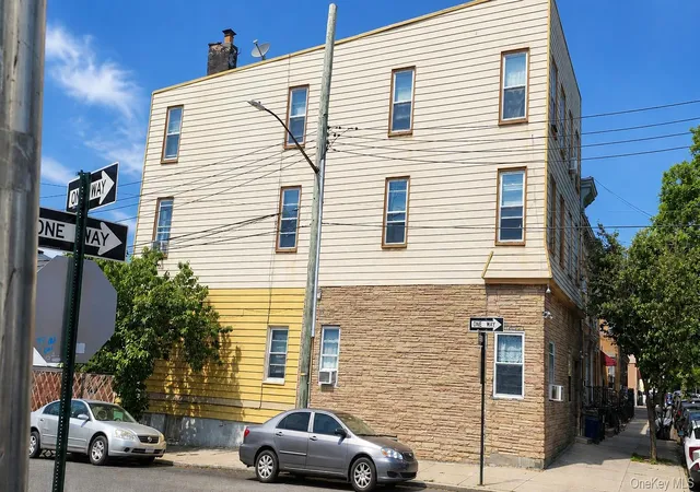 Photo 2 of Multi family home for sale at 5427 Arnold Ave, New York, NY 11378 | MLS# 990773 | Listing updated on 2026-08-06