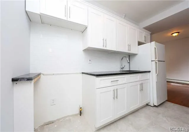 Photo 12 of Multi family home for sale at 104 33 88th Avenue, Richmond Hill, NY 11418 | MLS# 992386 | Listing updated on 2026-05-05