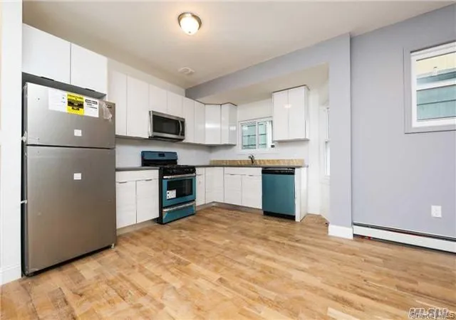 Photo 2 of Multi family home for sale at 104 33 88th Avenue, Richmond Hill, NY 11418 | MLS# 992386 | Listing updated on 2026-05-05
