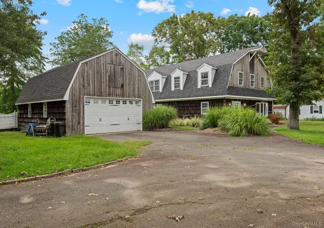 Photo 2 of Single family home for sale at 1 Lake Dr, Brookhaven, NY 11953 | MLS# 992697 | Listing updated on 2026-09-06