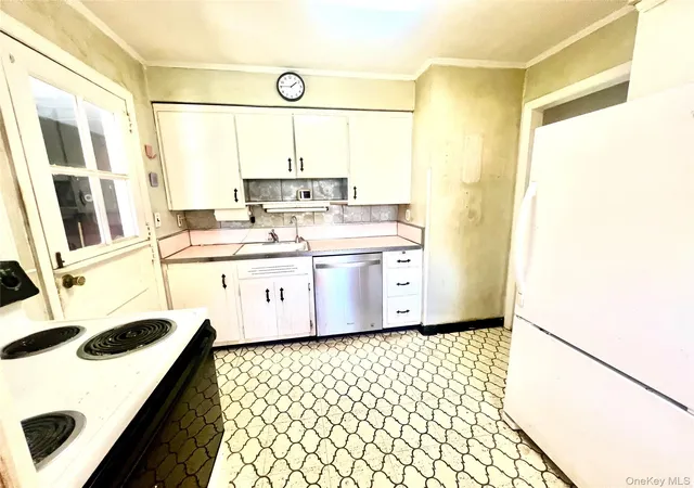 Photo 4 of Single family home for sale at 446 Howard Ave, Woodmere, NY 11598 | MLS# 993147 | Listing updated on 2026-05-08