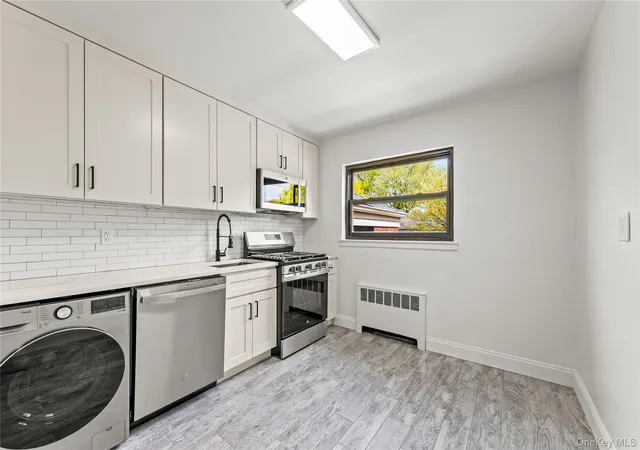 3rd image of 74-16 220Th St, New York, NY 11364